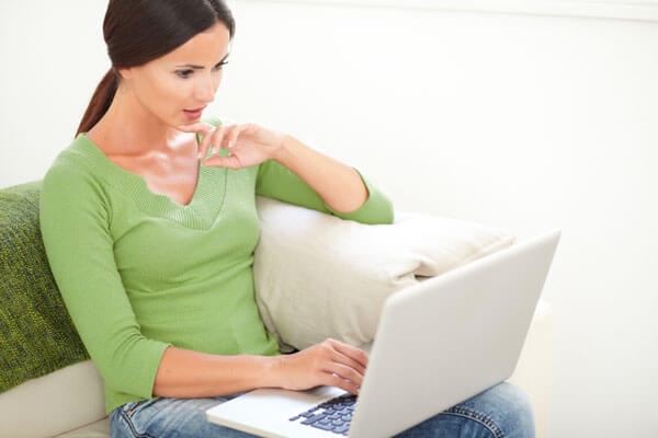 Female student using a laptop.